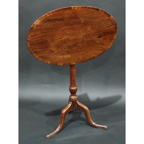 2050 - A 'George III' mahogany and oak tripod ocassional table, the associated crossbanded top outlined wit... 