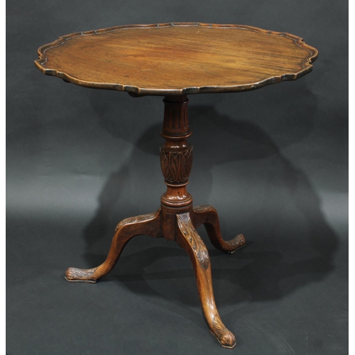 2051 - A George III mahogany piecrust supper table, circular tilting top, turned pillar, cabriole legs carv... 