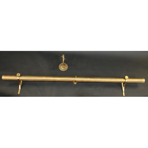 2052 - A Country House brass curtain pole, U-shaped brackets, 215cm long; an early 20th century wall sconce... 