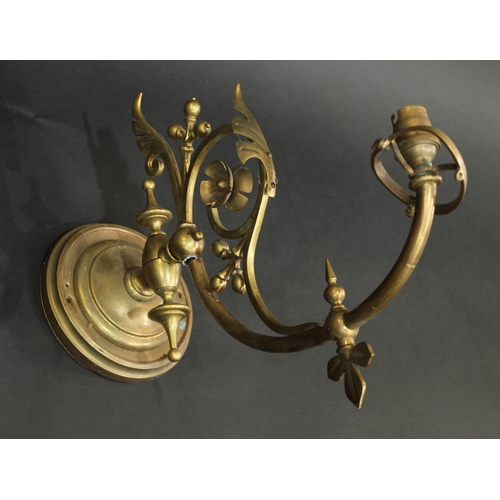 2052 - A Country House brass curtain pole, U-shaped brackets, 215cm long; an early 20th century wall sconce... 