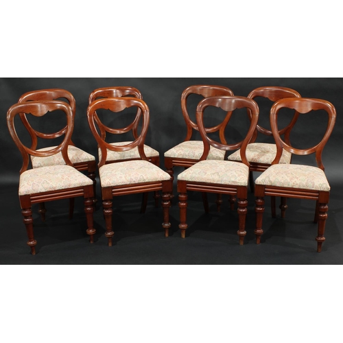 2071 - A set of eight Victorian mahogany balloon back dining chairs, drop-in seats, moulded rails, turned l... 