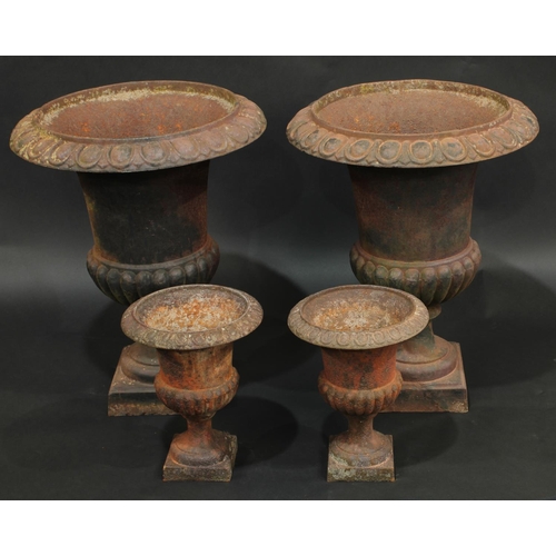 2072 - A pair of Victorian half-fluted campana garden urns, egg-and-dart rims, square bases, 63cm high, 47c... 