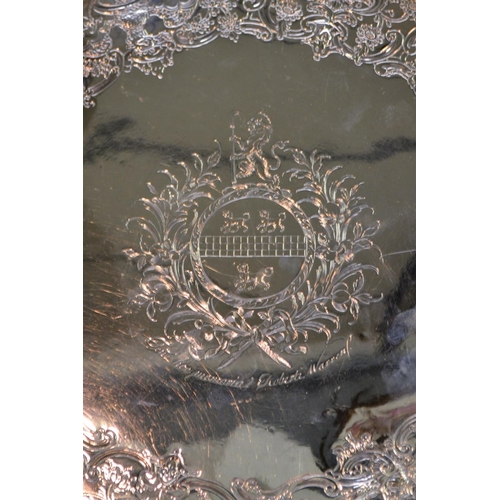 701 - A George III silver shaped circular salver, gadrooned border, the field chased in the Chinoiserie ta... 