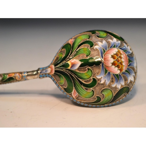 735 - A large Russian silver and cloisonne enamel spoon, decorated in polychrome with flowers and scrollin... 