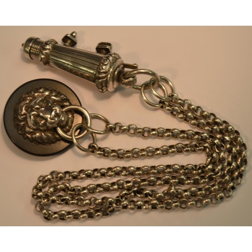 814 - A Victorian silver military officer's whistle, of cannon barrel form, suspension chain and lion mask... 