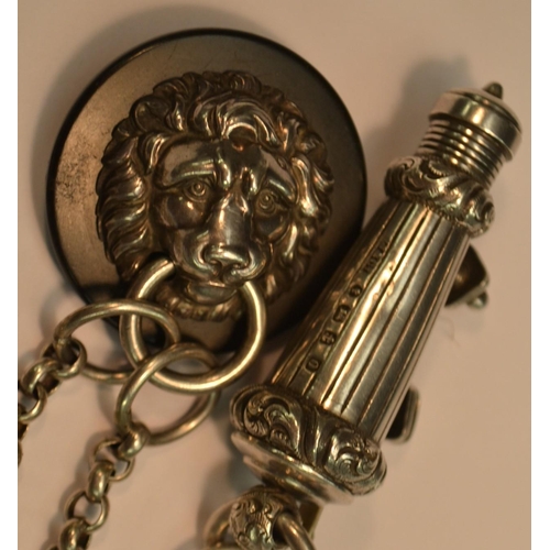 814 - A Victorian silver military officer's whistle, of cannon barrel form, suspension chain and lion mask... 