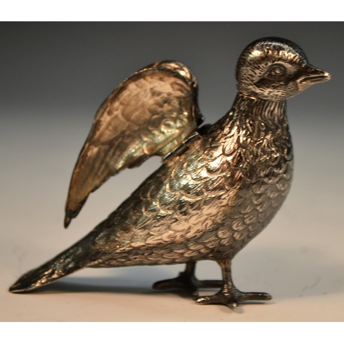 848 - An early 20th century Continental silver novelty pepper, as a bird, articulated wings, detachable he... 