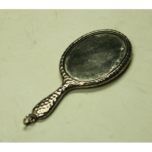 5168 - A miniature silver hand mirror, Birmingham 1904, 7cm long