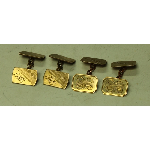 5710 - A pair of gentleman's 9ct gold canted rectangular cufflinks; another pair