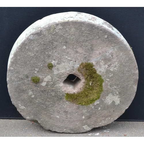 1276 - A 19th century Derbyshire gritstone  mill stone, 73cm diameter, 14cm deep