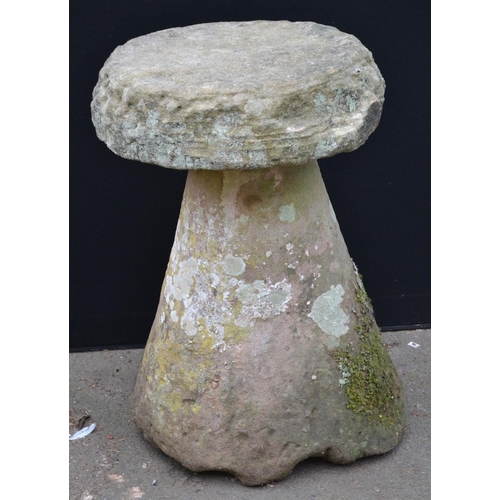 1298 - A 19th century  Derbyshire gritstone staddle stone, circular top, 68cm high