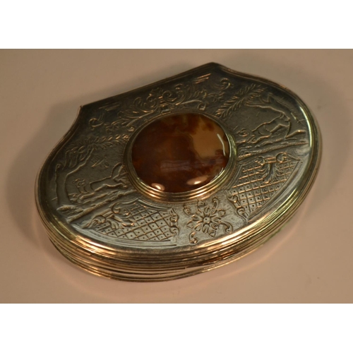 834 - An 18th century agate mounted silver shell shaped snuff box, hinged cover engraved with a fox and ho... 