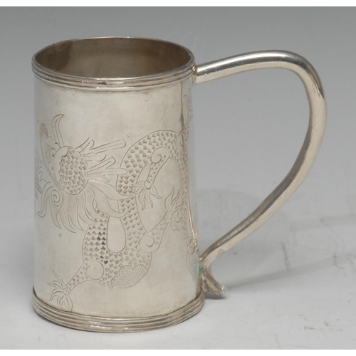 895 - A Chinese silver spreading cylindrical christening mug, engraved with scrolling dragons chasing the ... 