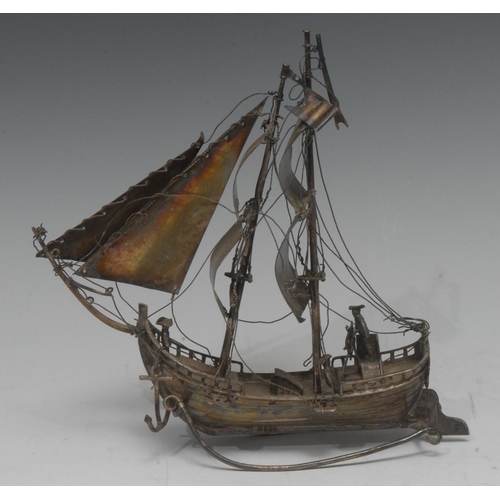 896 - An Edwardian  silver novelty, of a sailing boat, at full sail, on rocker, 15cm wide, import London m... 