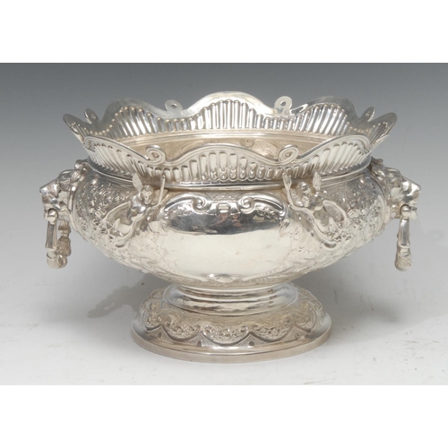 897 - A Victorian  silver pedestal 'Armada' bowl, vacant cartouche flanked by two angels in relief, heavil... 