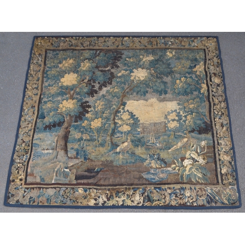 1287 - A 17th century French tapestry, the friezes worked in the baroque manner with verdure of scrolling f... 