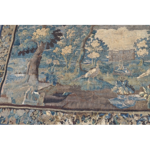 1287 - A 17th century French tapestry, the friezes worked in the baroque manner with verdure of scrolling f... 