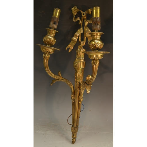 1656 - A pair of Neo-Classical design gilt metal two-light wall lights, ribbon tied, campana shaped sconces... 