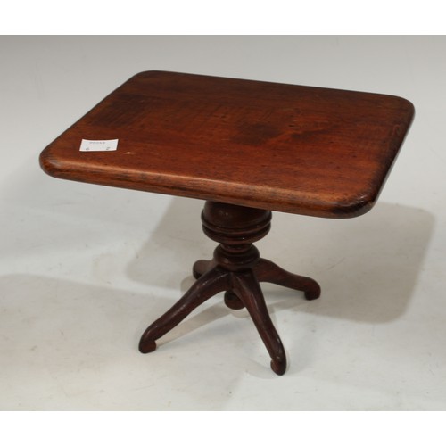 61 - A miniature apprentice type mahogany tilt top table, turned support, tripod base, 15cm high; an oval... 