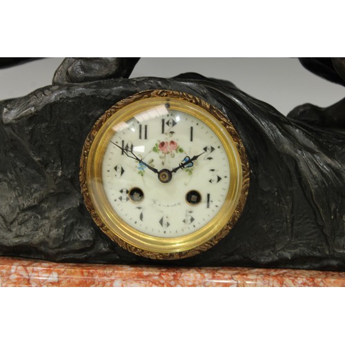 70 - An Art Deco clock, Lion on the Lookout, after Boffi, rouge marble base, 58cm wide