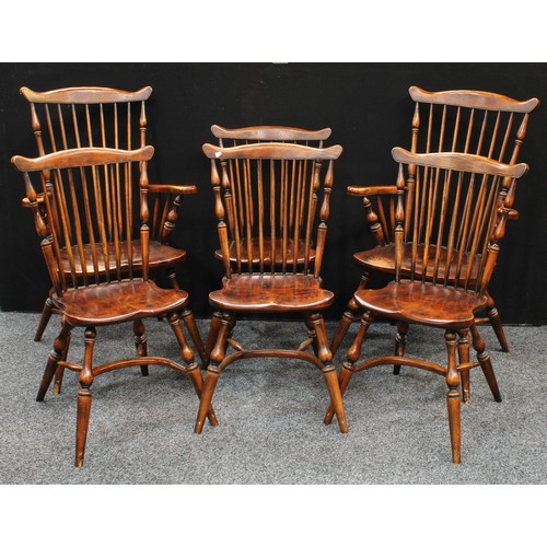 72 - A set of six elm stick-back dining chairs, of Primitive Yorkshire Windsor design, comprising a pair ... 