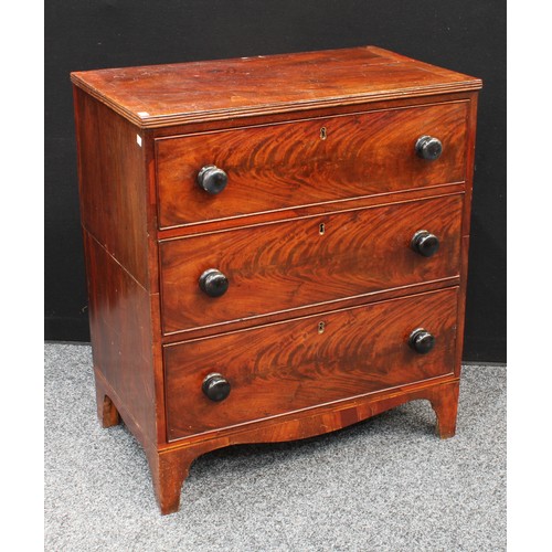 81 - A George III mahogany chest, of small proportions, slightly oversailing crossbanded rectangular top ... 