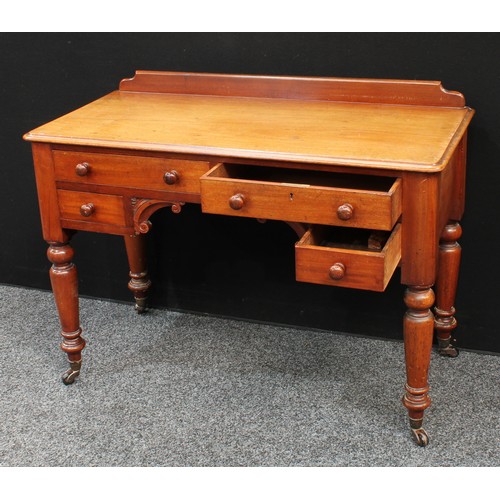 86 - A Victorian mahogany desk/dressing table, shallow half gallery, moulded slightly oversailing rectang... 