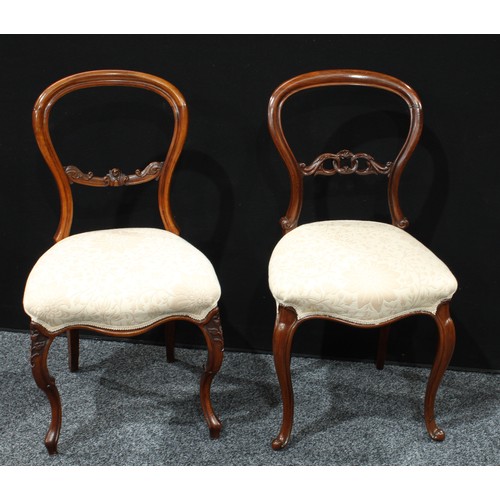 90 - A set of three Victorian mahogany balloon back side chairs; another, pair, similar (5)