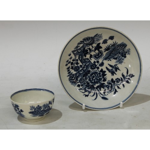 92 - A Worcester Fence pattern miniature pattern tea bowl and saucer, decorated in underglaze blue with f... 