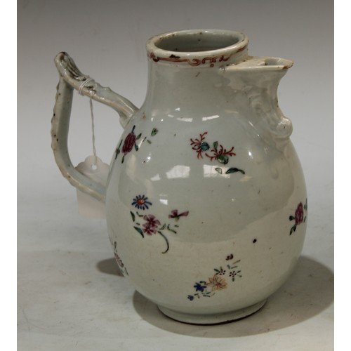 94 - An 18th century Chinese chocolate pot, for the continental market, decorated with foliate sprigs in ... 