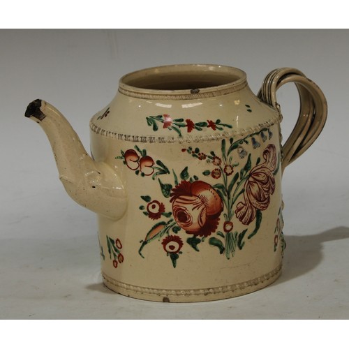 104 - An  18th century Leeds creamware cylindrical teapot, painted with stylised peonies and tulips, inter... 