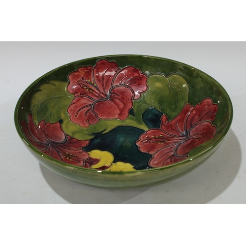 117 - A Moorcroft Hibiscus pattern fruit bowl 26.5cm diameter