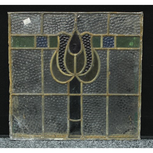 132 - A large Art Nouveau stained glass panel; two others, square, similar (3)