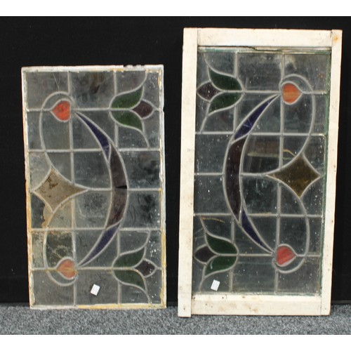 133 - A pair of Art Nouveau stained glass panels