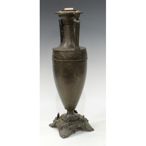 137 - A 19th century Grecian Revival brown patinated bronze table lamp, of loutrophoros form, figural hand... 