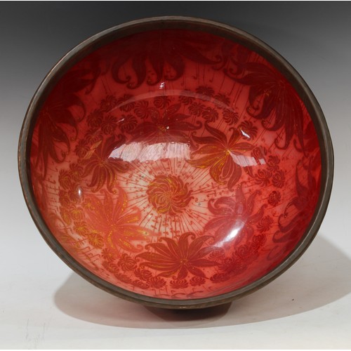 140 - A Bernard Moore red lustre punch bowl, decorated with large leaves on a red ground, metal rim, 40cm ... 