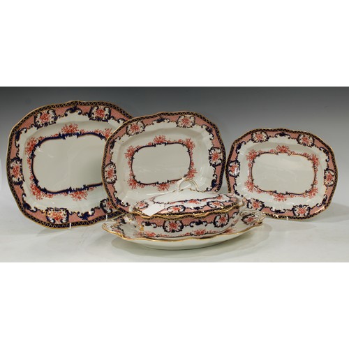 107 - An extensive Royal Crown Derby 3653 Imari dinner service, comprising meat plate with well, 55cm, eig... 