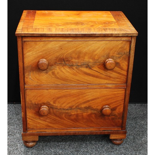 158 - A George III style walnut side cabinet, as a chest of two long drawers, the top and front hinged to ... 