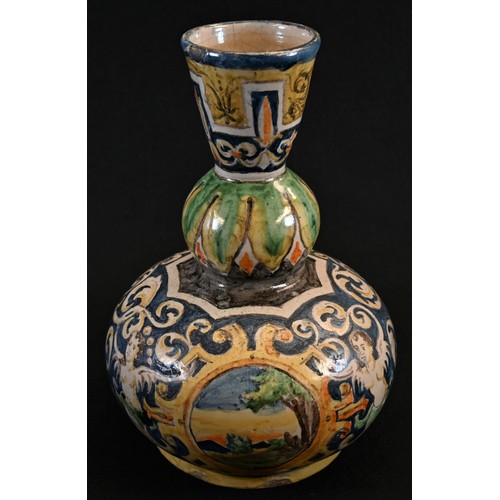 5180 - A maiolica gourd shaped vase, painted in the istoriato manner with landscape vignettes, herms and sc... 