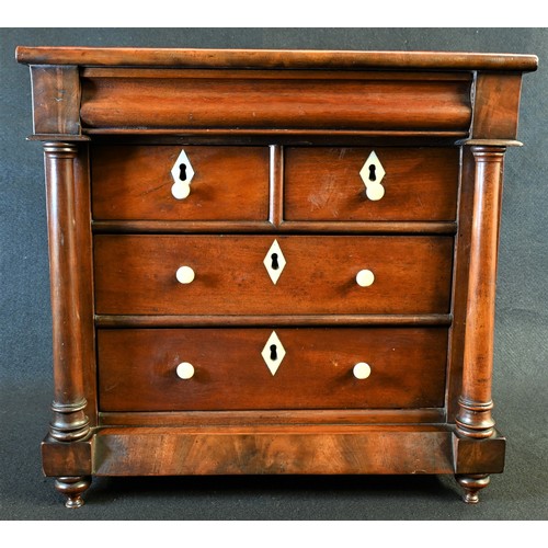 5354 - An early Victorian mahogany miniature chest of drawers, crossbanded top above a cushion moulded frie... 