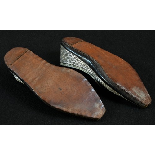 5220 - A pair of Ottoman child's shoes, profusely worked in silvered thread, 16cm long