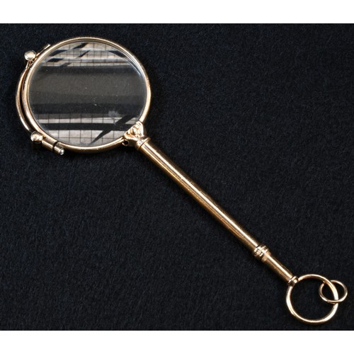 5205 - A pair of 19th century gilt metal folding pince-nez, ring terminal, 10.5cm wide