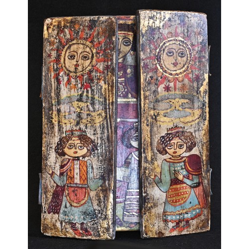 5366 - An Ethiopian Coptic triptych, painted in polychrome and gilt with saints, 22cm high