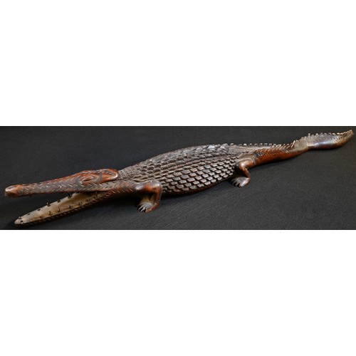 5494 - Tribal Art - a Papua New Guinea hardwood carving, of a crocodile, 74cm long, Karawari, East Sepik Pr... 