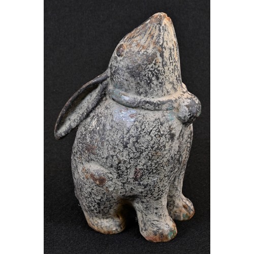 5095 - A Chinese cast iron model, of a moon gazing hare, 15.5cm high