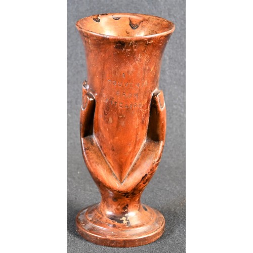 5481 - Travel and the South Seas - a hardwood goblet or vase, typically carved with a grasping hand and sta... 