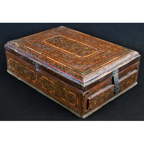 5380 - An Indo-Persian penwork vanity box, hinged cover enclosing an adjustable mirror, decorated overall i... 