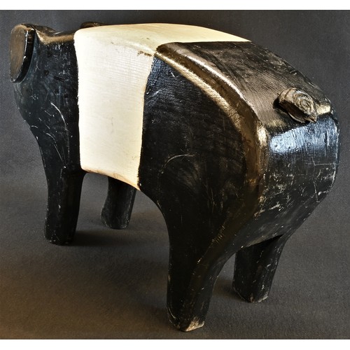 5261 - A softwood shop display model, of a pig, as an oversize money box, coin aperture to back, the tail f... 