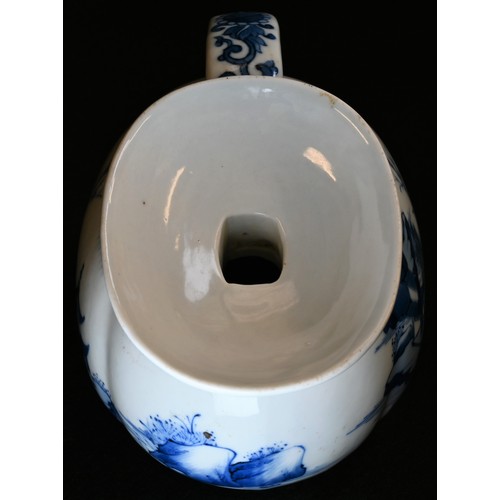 5105 - A Chinese ovoid ewer, decorated in tones of blue and white with pagodas in a monumental landscape, 2... 