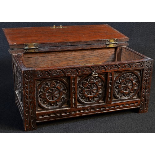 5347 - An early 20th century oak box, as a 17th century blanket chest, hinged cover, the panelled front and... 